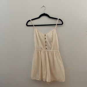 urban outfitters button front romper with smock back